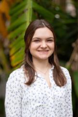 Student headshot - standing outside looking at camera